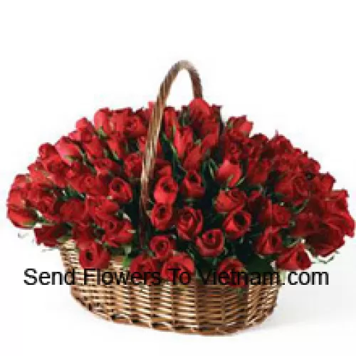 A Beautiful Arrangement Of 100 Red Roses With Seasonal Fillers