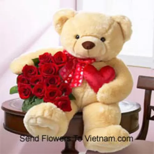 Bunch Of 12 Red Roses With A 24 Inches Tall Teddy Bear (Please Note That We Reserve The Right To Substitute The Teddy Bear With A Teddy Bear Of Equal Value And Size In Case Of Non-Availability Of The Same. Limited Stock. While Substituting The Product We Will Ensure That The Same Exclusivity Is Maintained)