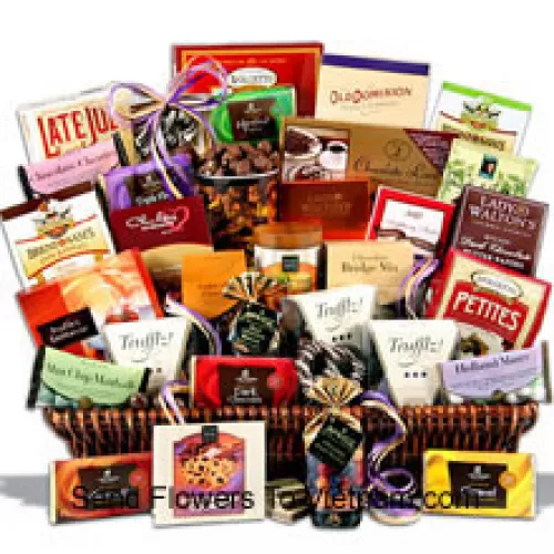 This giant chocolate gift basket is loaded with thirty of our favorite chocolate indulgences that are guaranteed to quench an army of chocolate lovers cravings! We create this masterpiece with only the finest award-winning gourmet chocolate delicacies sourced from around the globe. The result of our efforts is a chocolate gift basket unrivalled in the gift world! Inside they will discover the finest the confectionery world has to offer from the top brands  (Please Note That We Reserve The Right To Substitute Any Product With A Suitable Product Of Equal Value In Case Of Non-Availability Of A Certain Product)