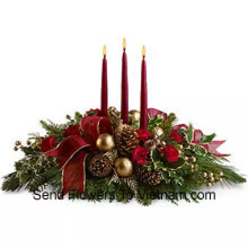 Red miniature carnations, pinecones, golden ornament balls, faux berries and assorted fresh evergreens  accented with a wired ribbon are arranged in a low dish with three red taper candles. (Please Note That We Reserve The Right To Substitute Any Product With A Suitable Product Of Equal Value In Case Of Non-Availability Of A Certain Product)